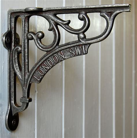 unique metal shelf brackets|artistic shelf brackets.